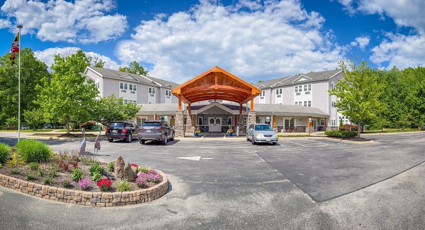 Exterior view of the assisted living facility with landscaping