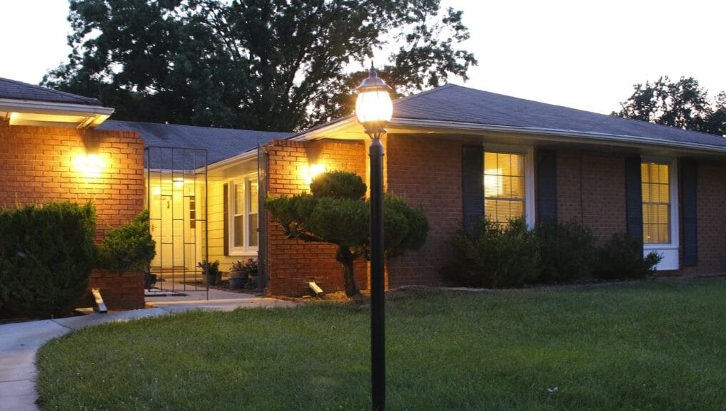 Exterior view of a senior living facility at dusk