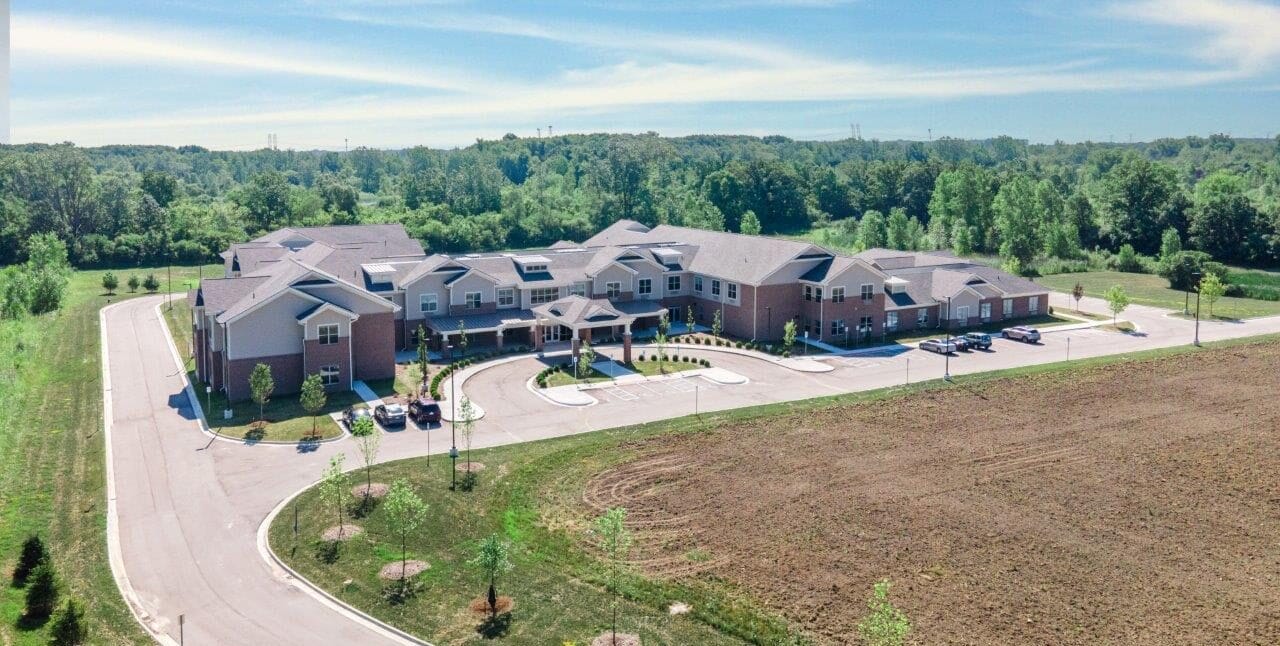 Aerial view of Kingsley Senior Living facility and surrounding area