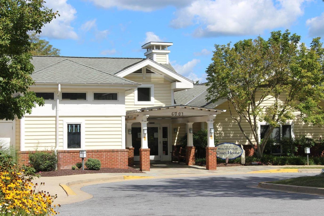 Exterior view of the Casey House facility with landscaping