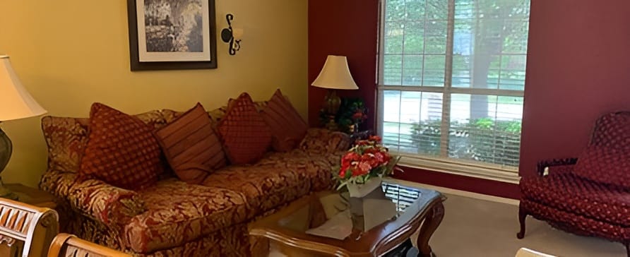 Cozy common area with couch and lamps
