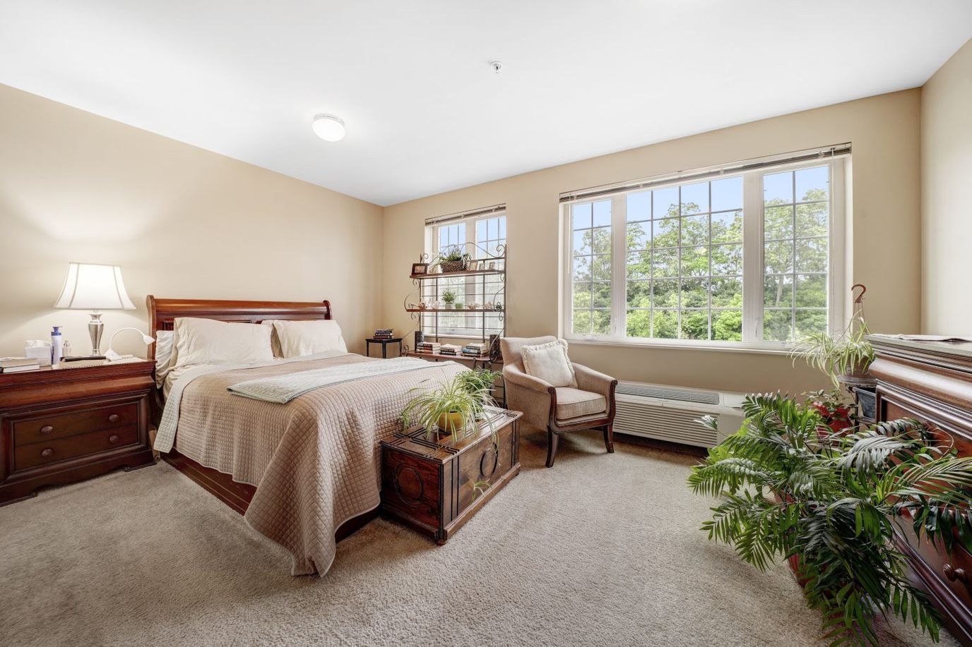Cozy resident bedroom with natural light
