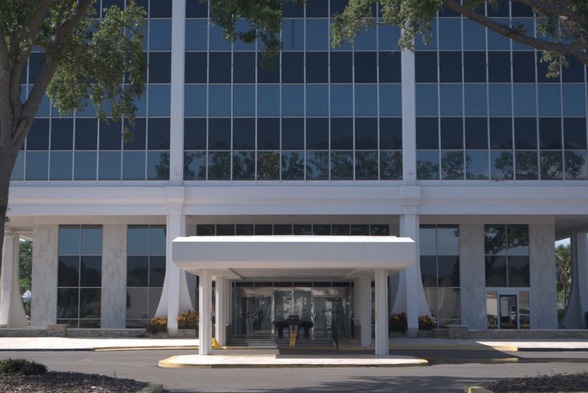 Exterior view of a modern assisted living facility entrance