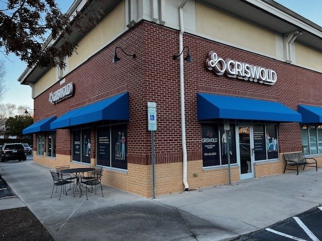 Exterior of Griswold Home Care facility with blue awnings