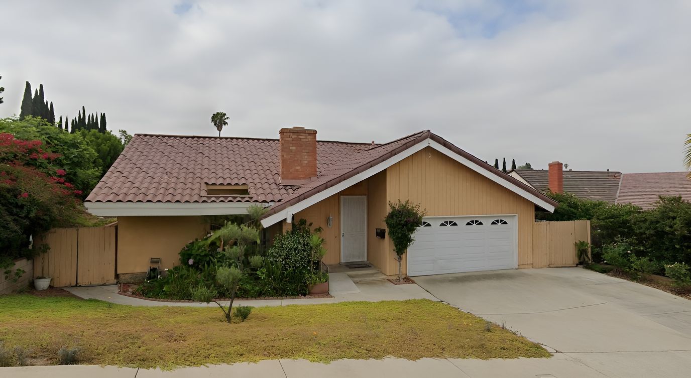 Exterior view of a residential facility with landscaping