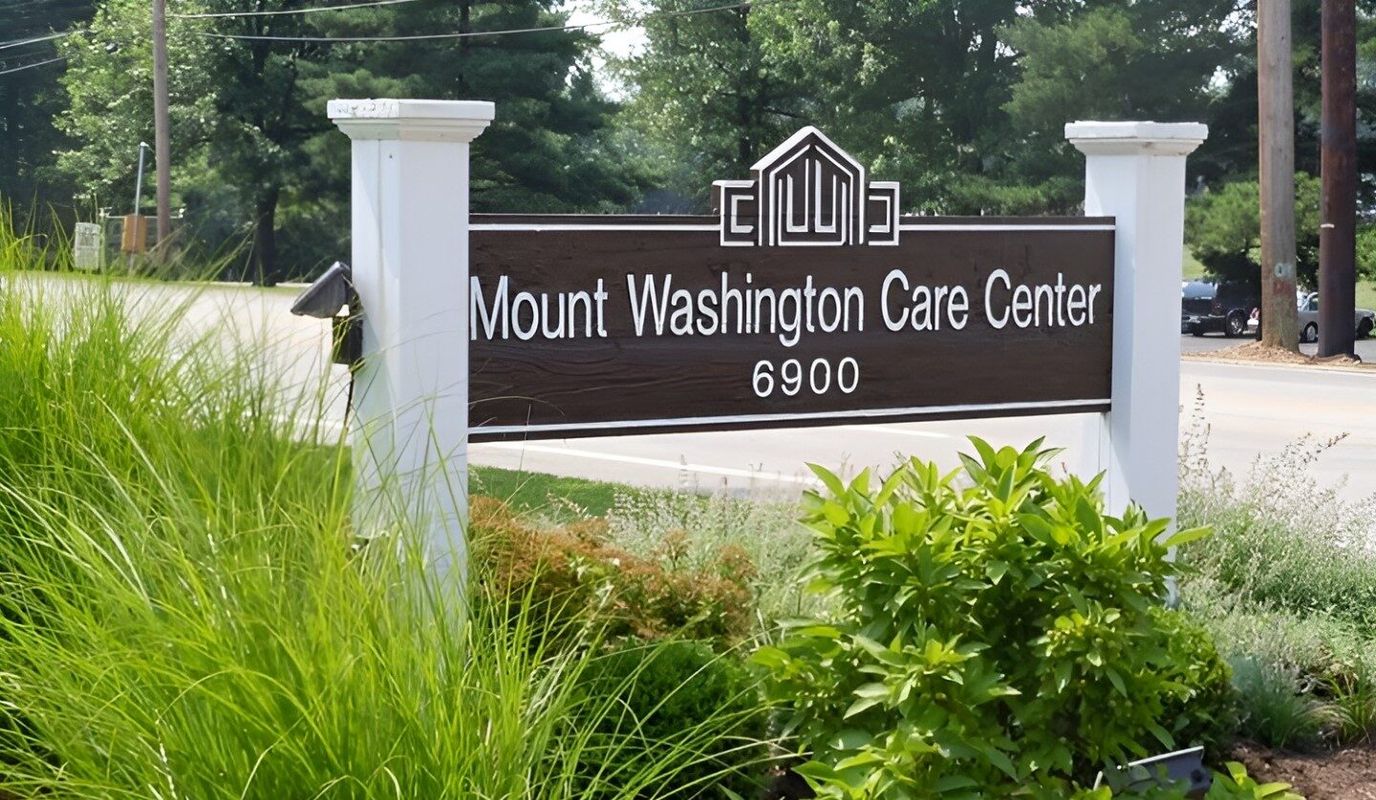 Sign for Mount Washington Care Center outside on a sunny day