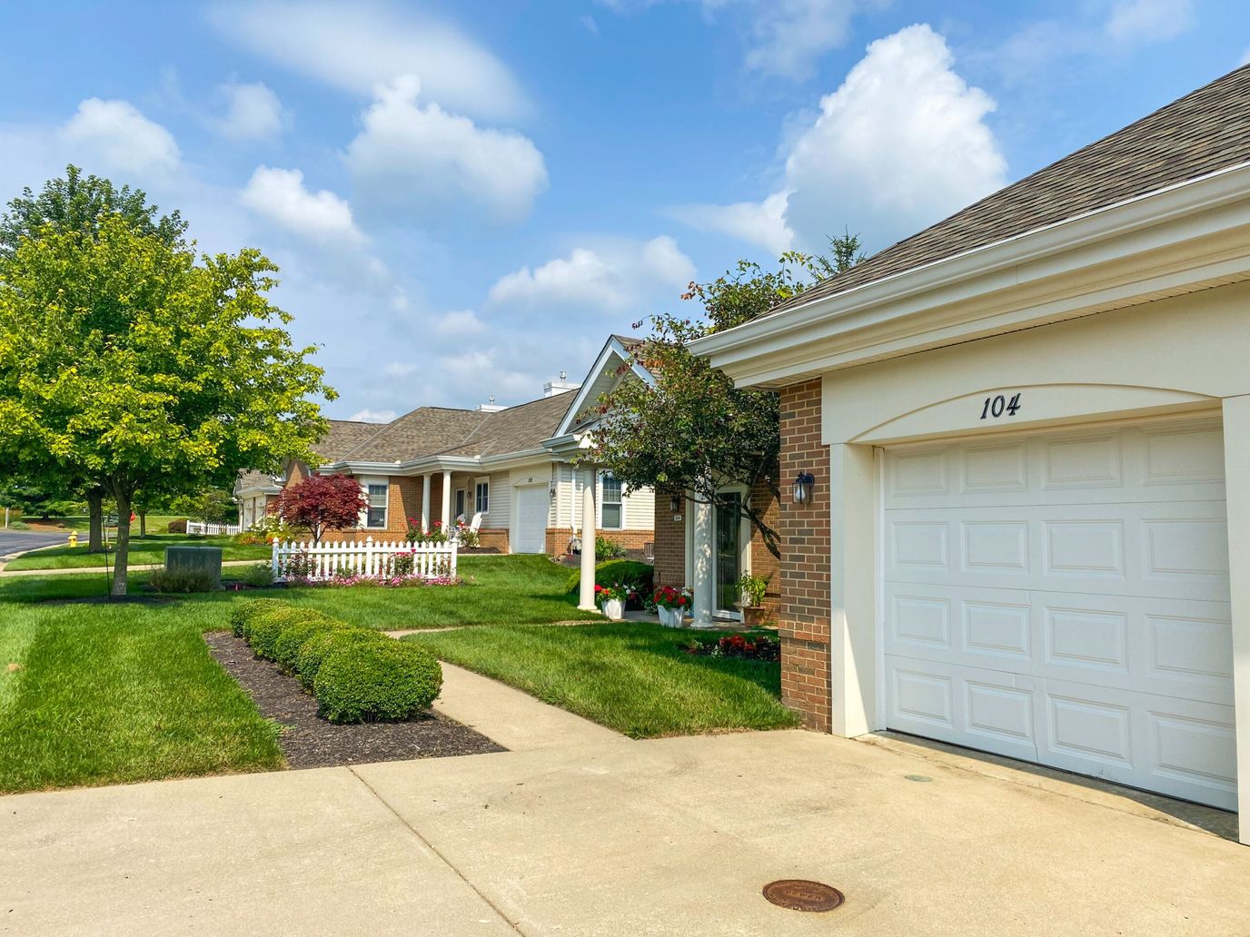 Outdoor view of senior living homes with green landscaping