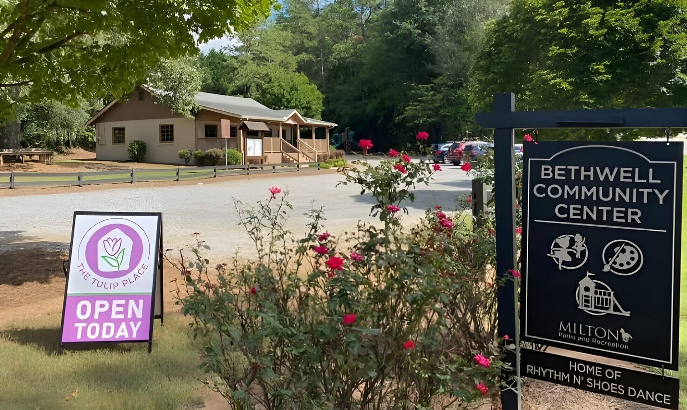 Exterior view of Tulip Place and community center sign