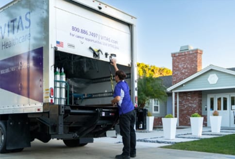Delivery truck at the entrance of the facility.