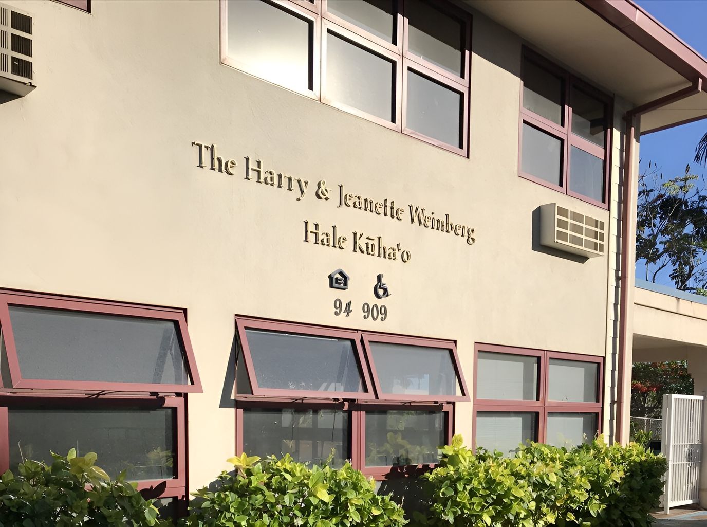 Exterior view of the facility with signage