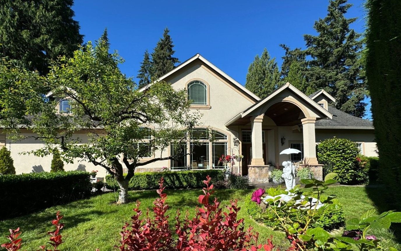 Exterior view of a senior care facility with gardens