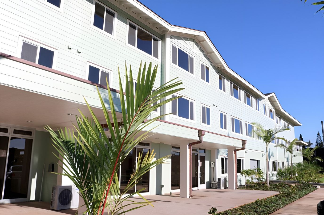 Exterior view of the Meheula Vista building with greenery