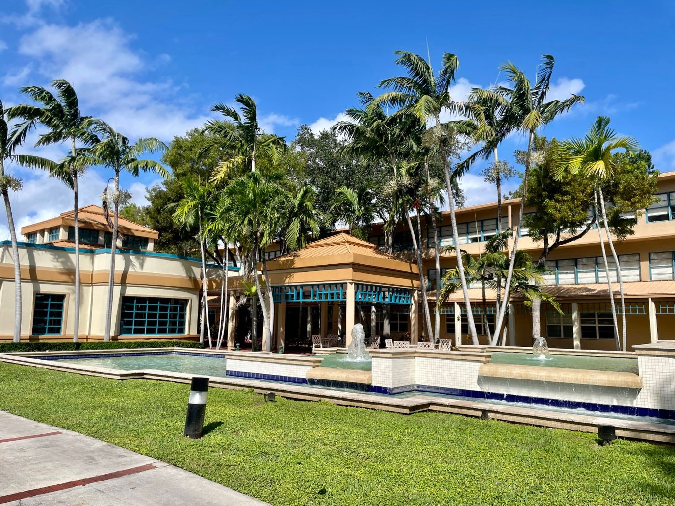 Exterior view of the Miami Jewish Health facility with a fountain