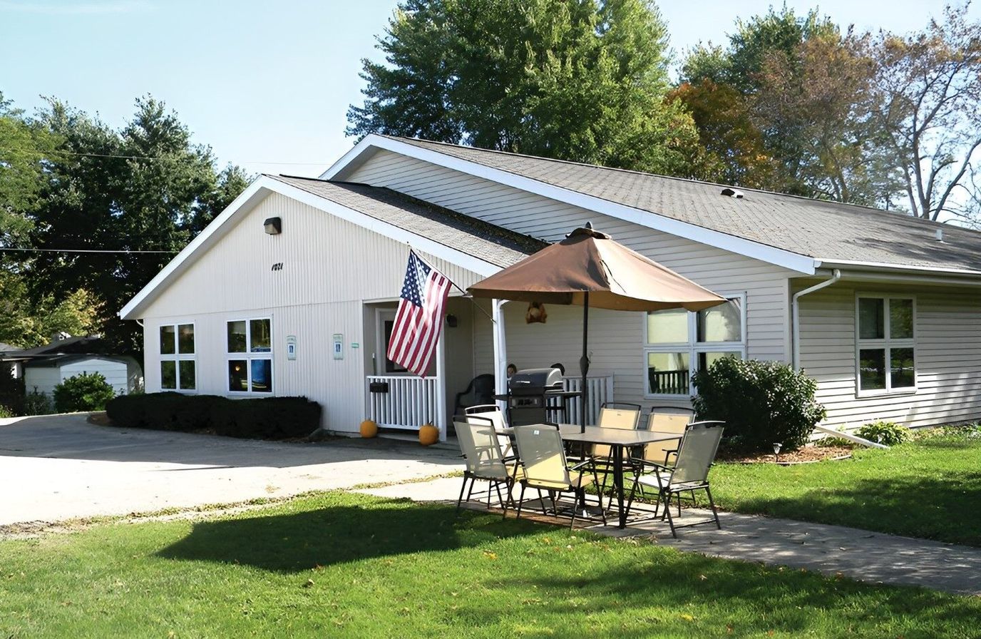 Exterior view of the facility with outdoor seating