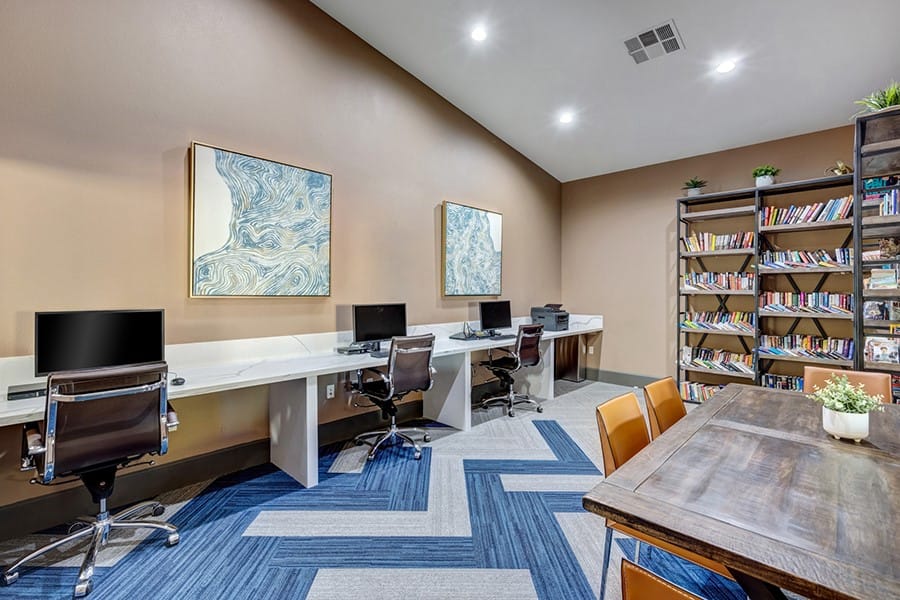 Interior of a modern communal workspace with computers