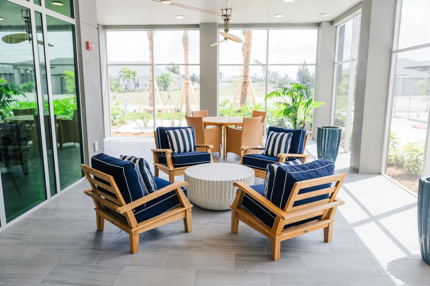 Bright indoor seating area with comfortable chairs