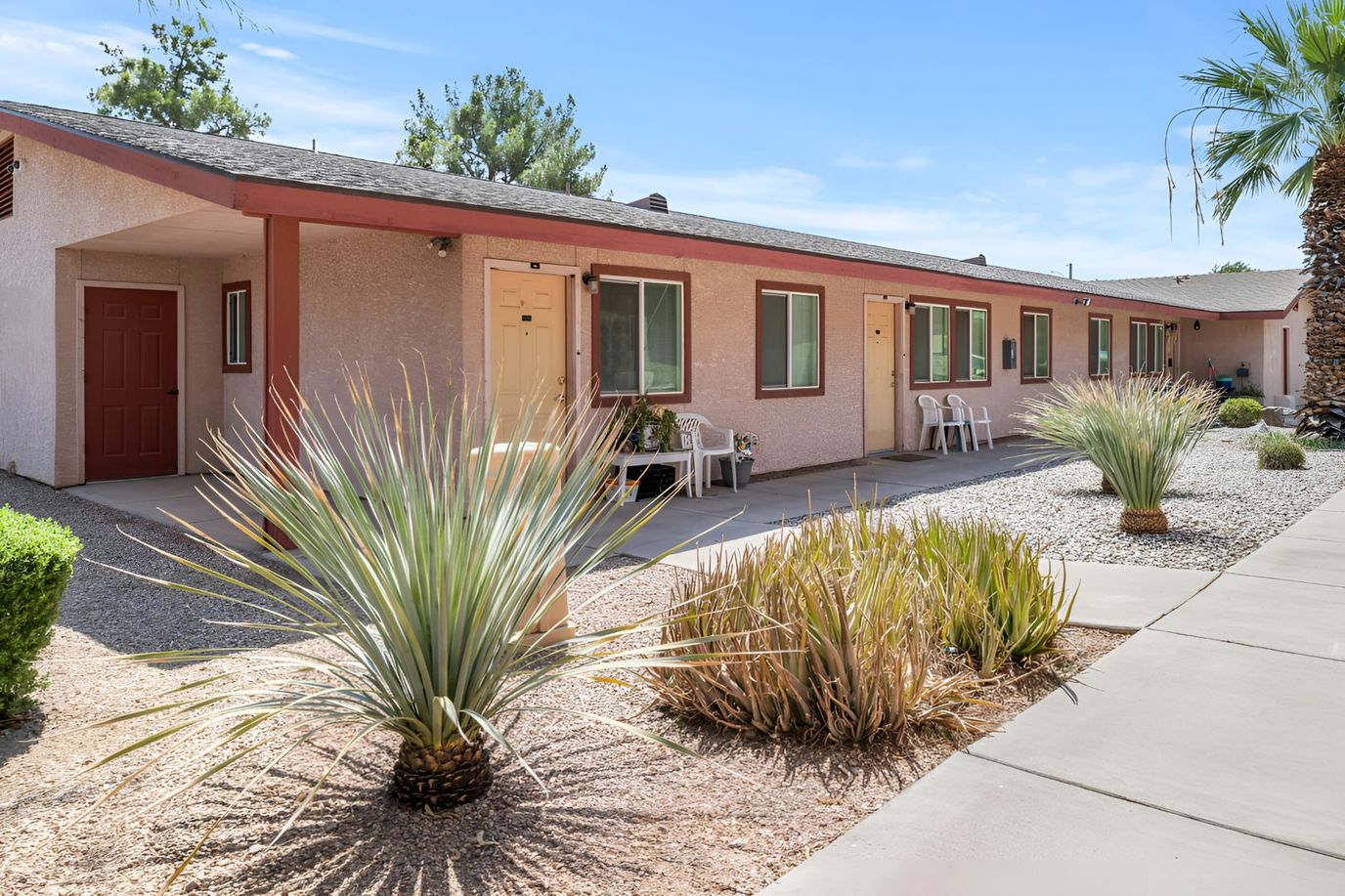 Outdoor view of a walkway with desert landscaping
