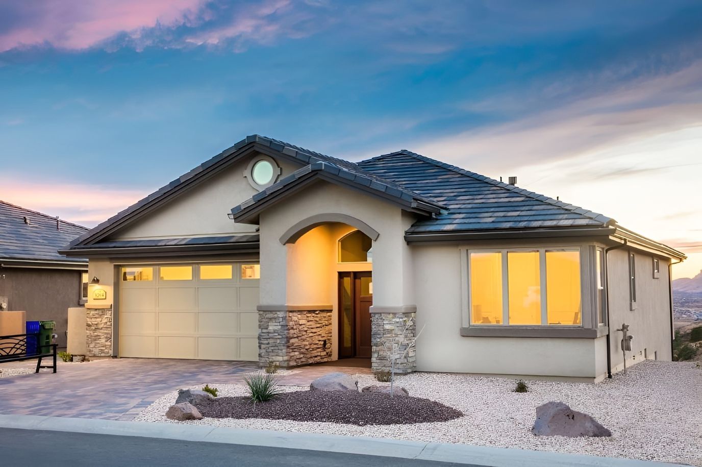 Exterior view of a modern assisted living home at dusk