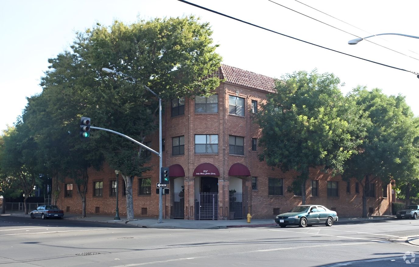Exterior view of Delta Plaza Apartments building