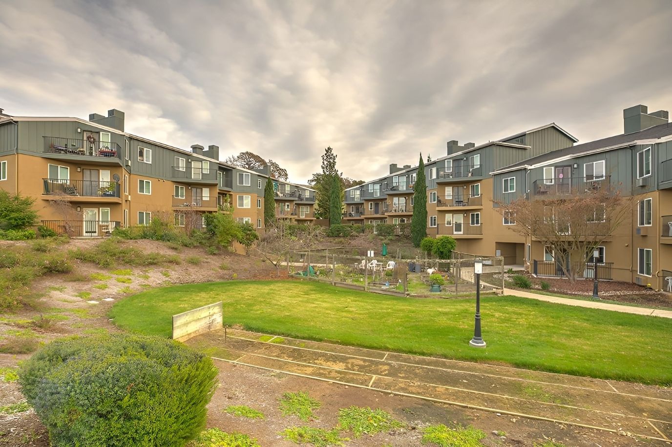 Outdoor area with residential buildings and gardens