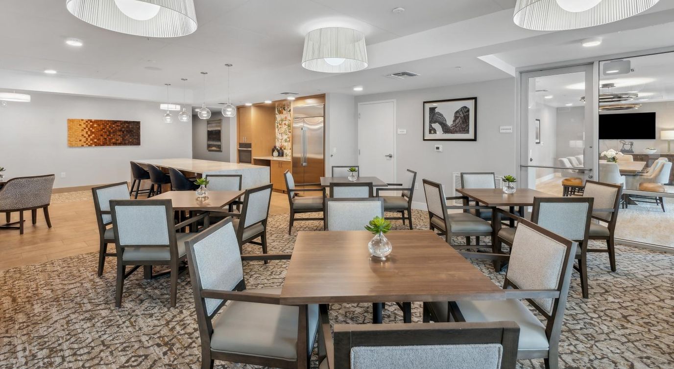 Modern dining area with tables and plants