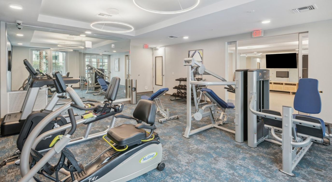 Interior view of a fitness area with exercise equipment