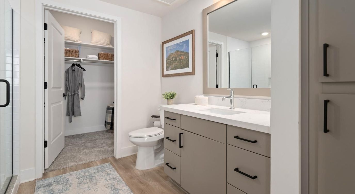 Well-decorated private bathroom in a resident's unit