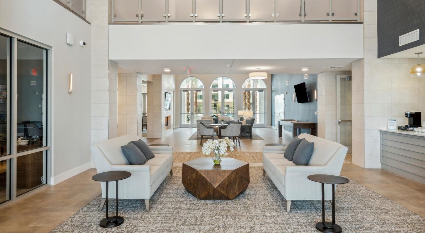 Bright and welcoming common area with seating and decor