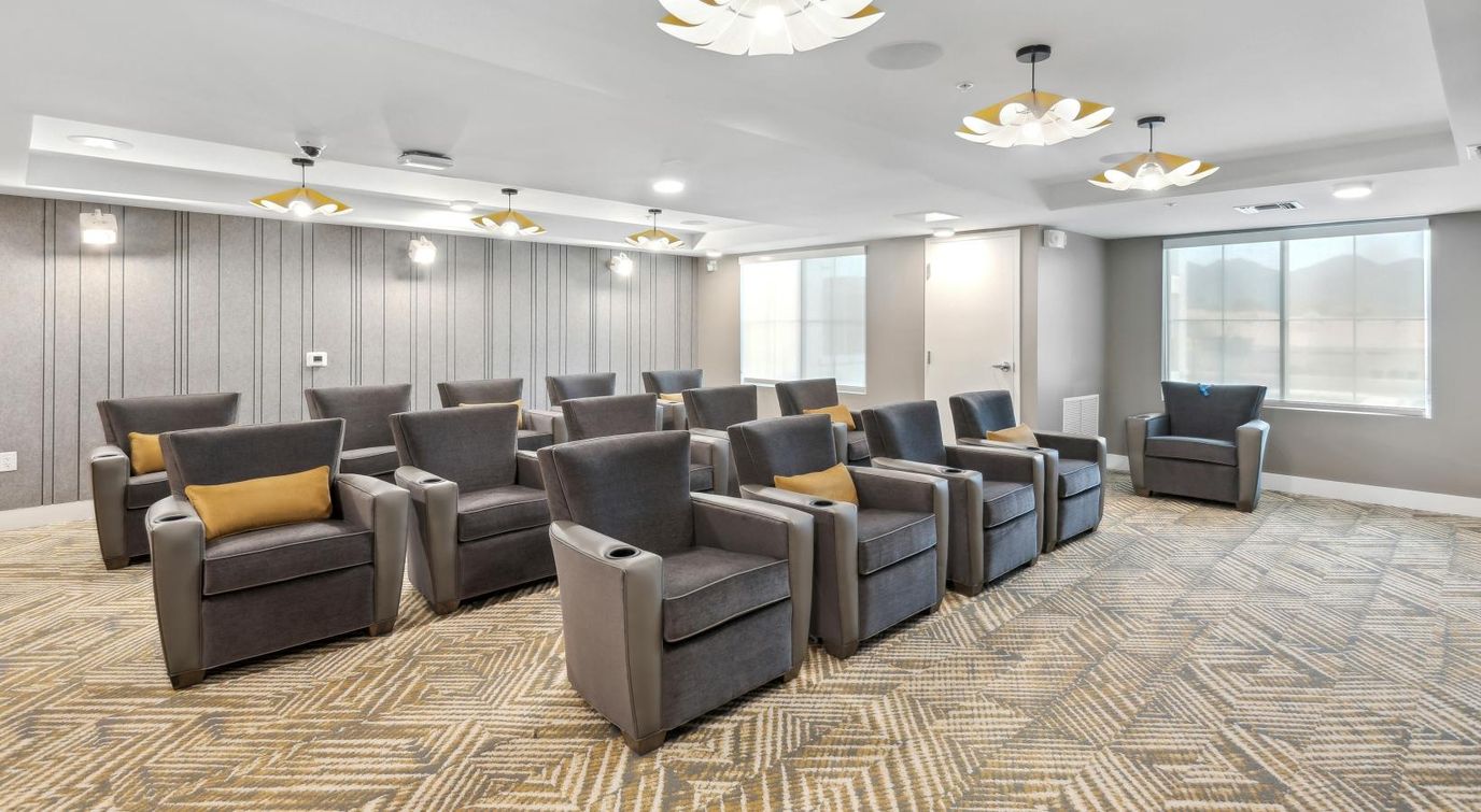 Interior activity room with seating and lighting
