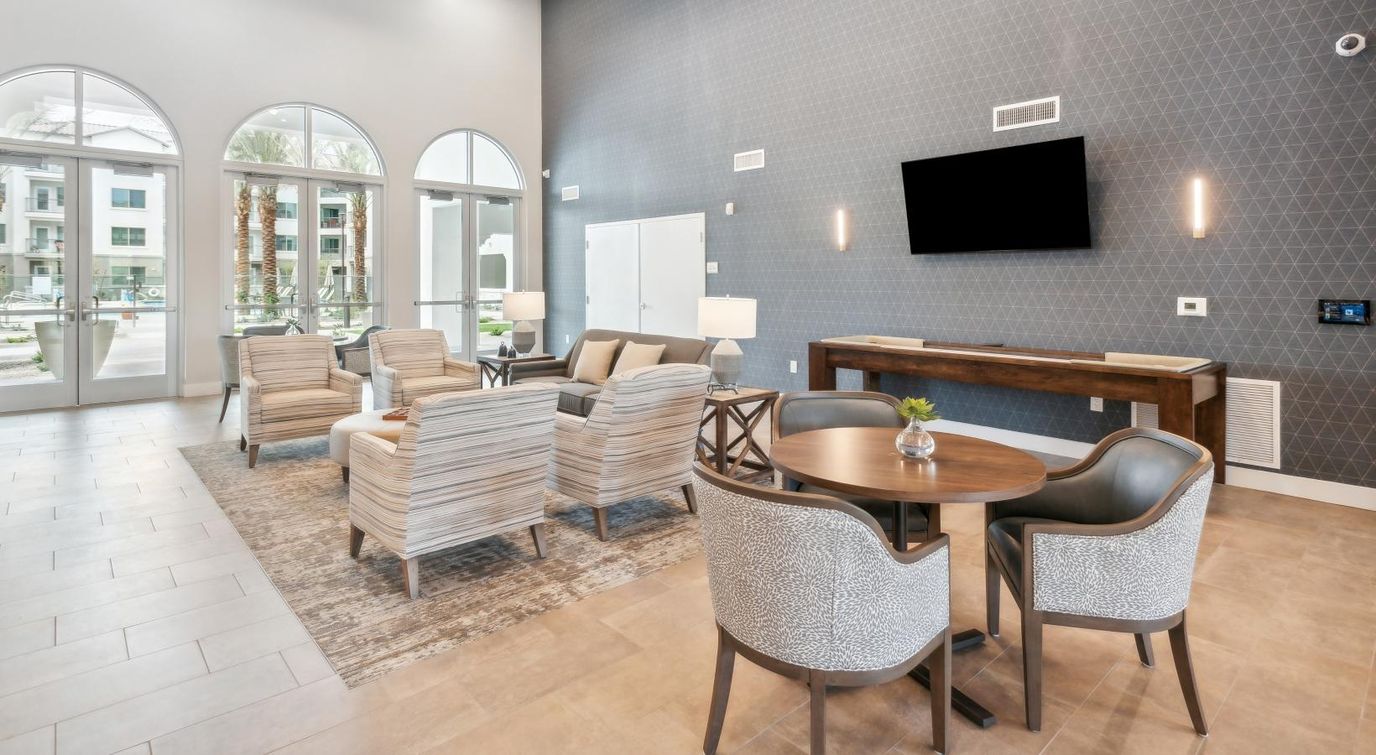 Bright interior common area with seating and decor