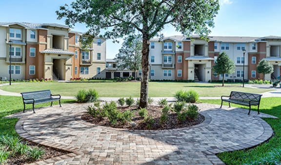 Landscape view of senior apartment complex courtyard