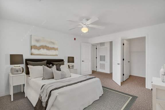 A well-furnished bedroom in a senior living apartment.