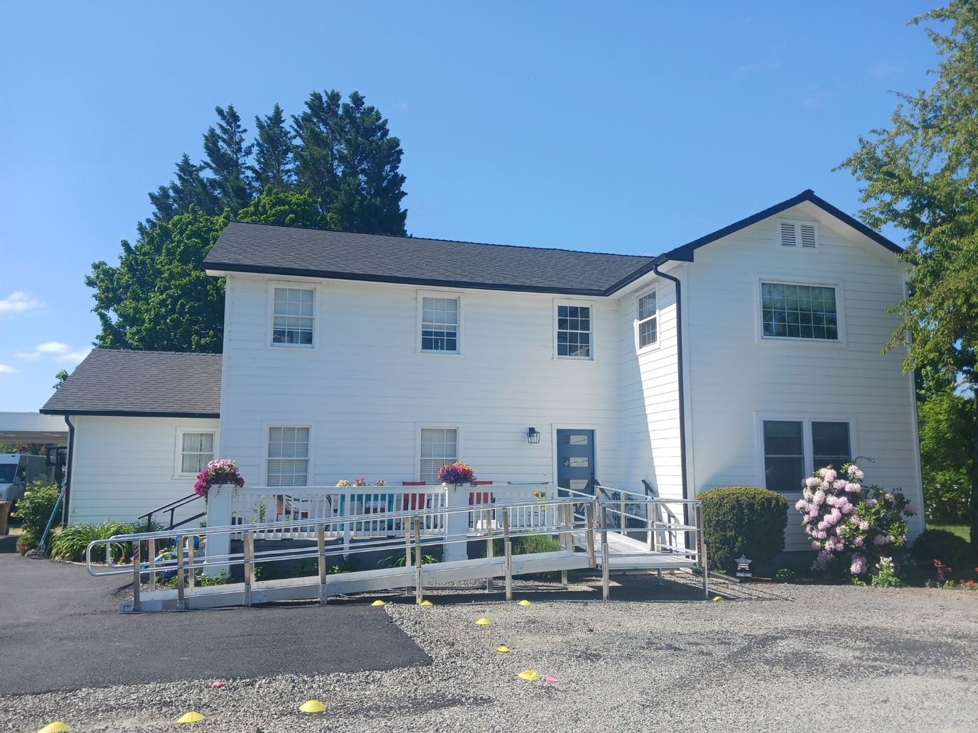 Exterior view of Blue Heron Adult Care Home with accessible ramp