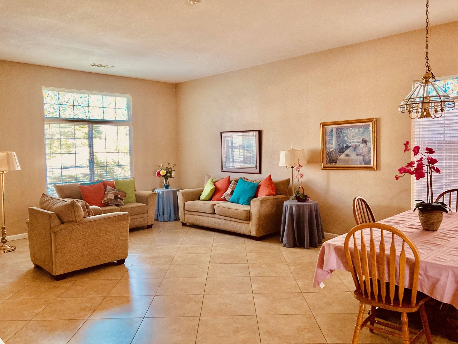 Bright common area with seating and decor