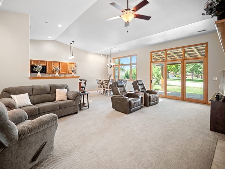 Bright common area with comfortable seating and outdoor view