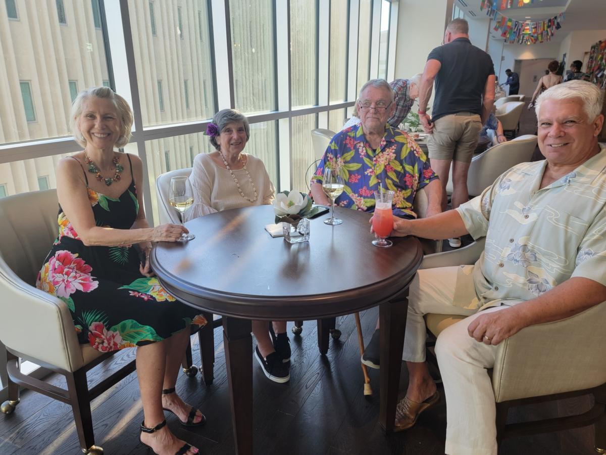 Residents enjoying drinks in a common area