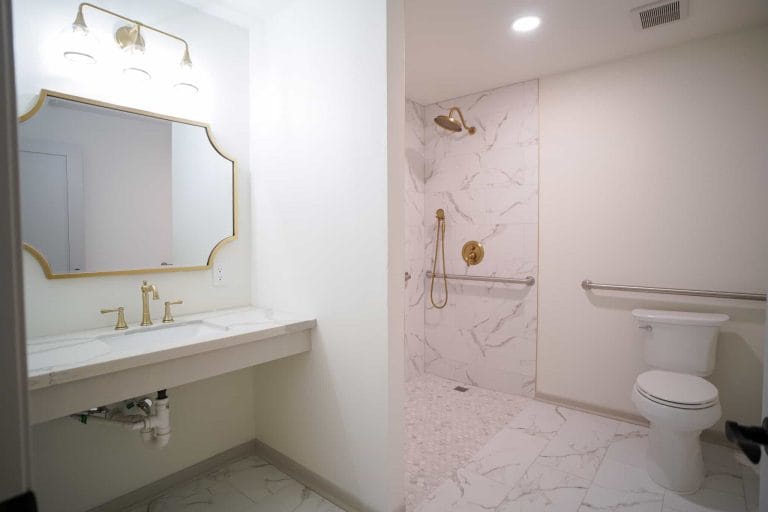Village Forest Care Cottage, assisted living in Rosenberg, TX — Modern bathroom with elegant fixtures and marble accents