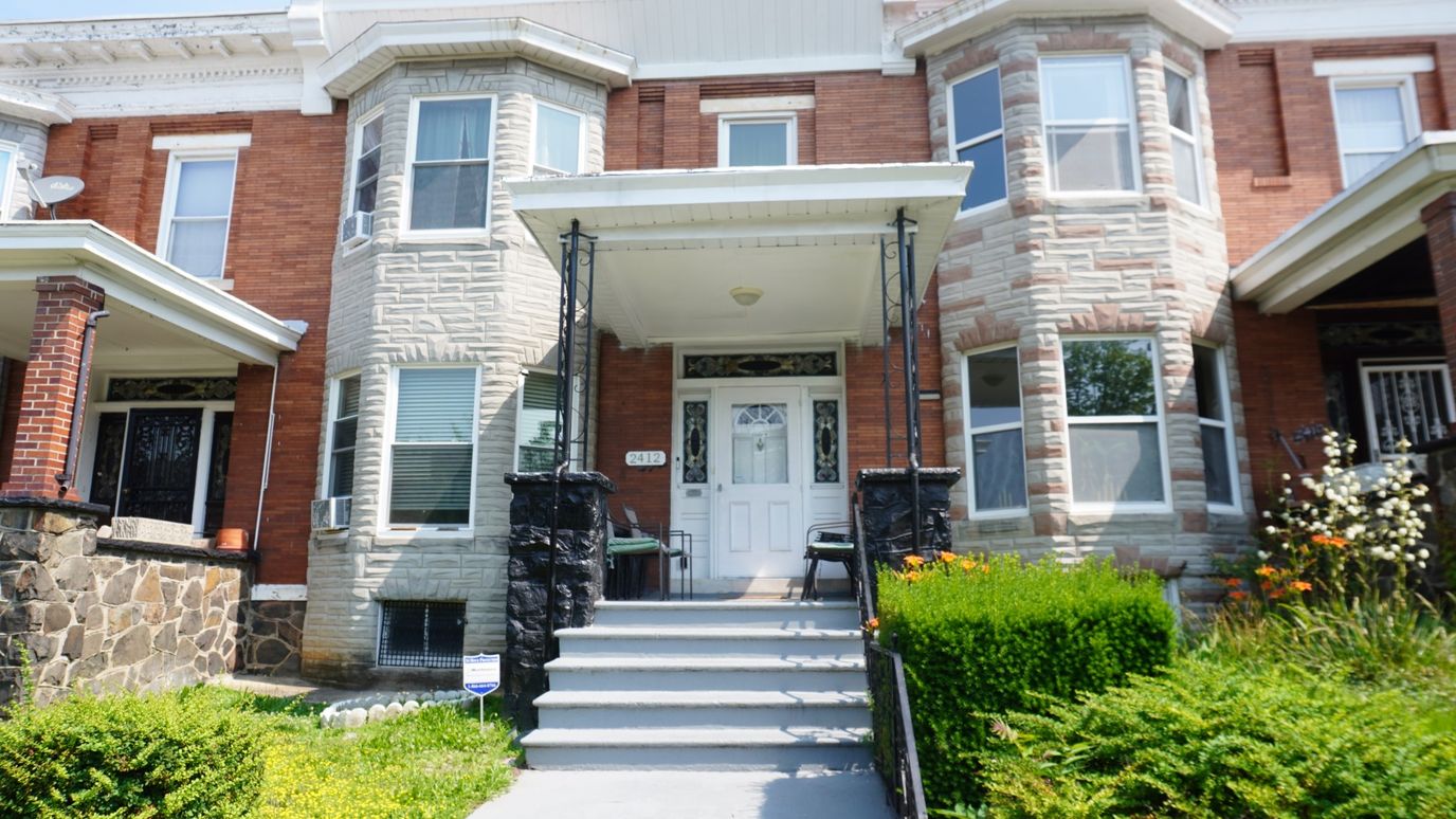 Exterior view of a residential facility with landscaping