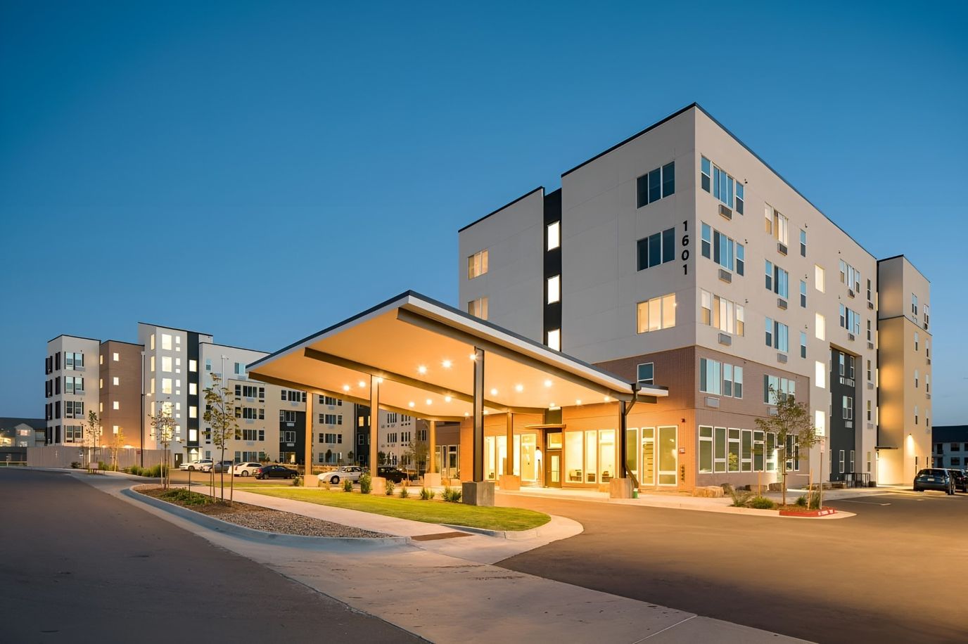 Exterior view of senior apartments at dusk