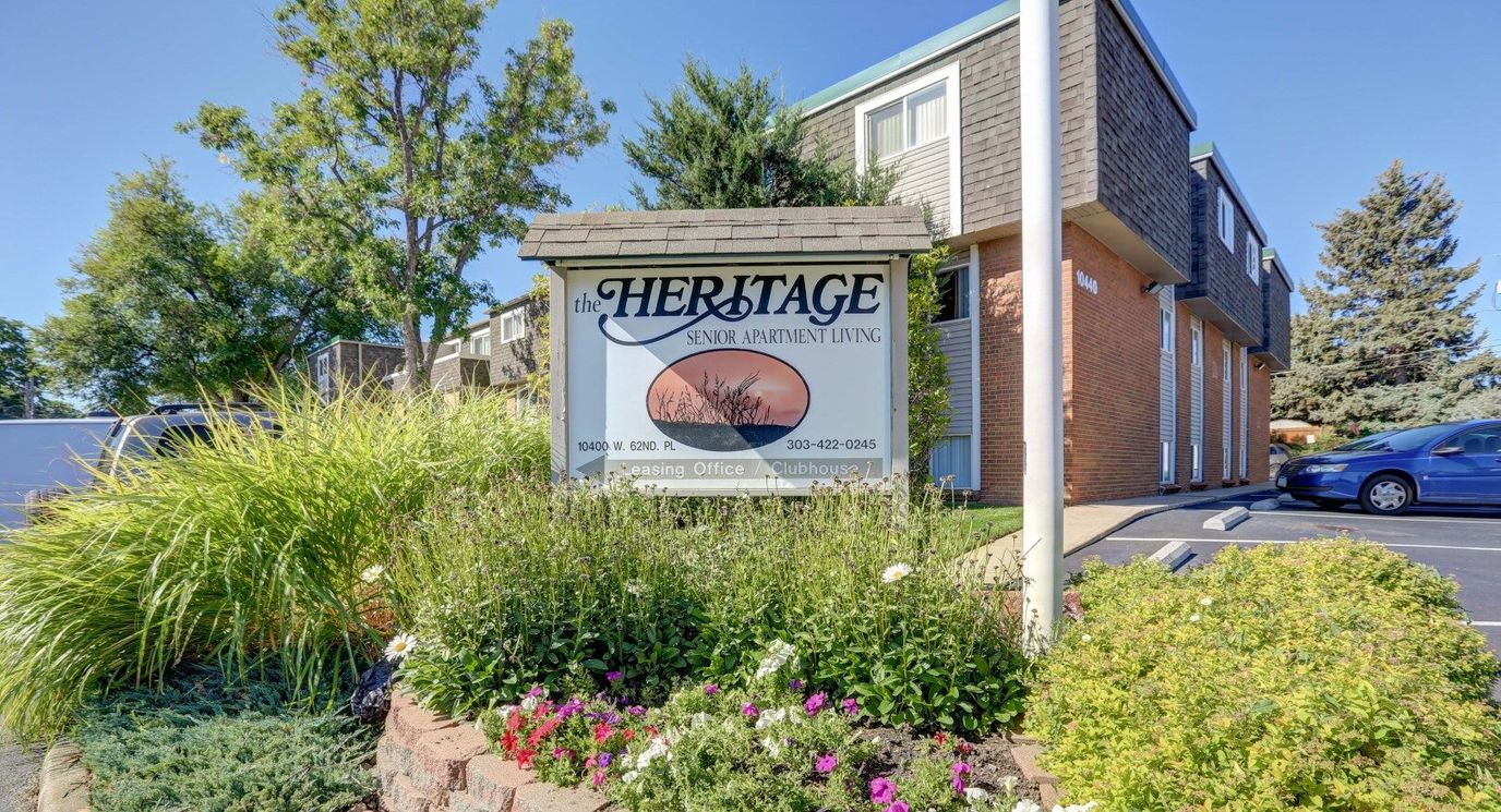 Exterior view of The Heritage senior living facility sign