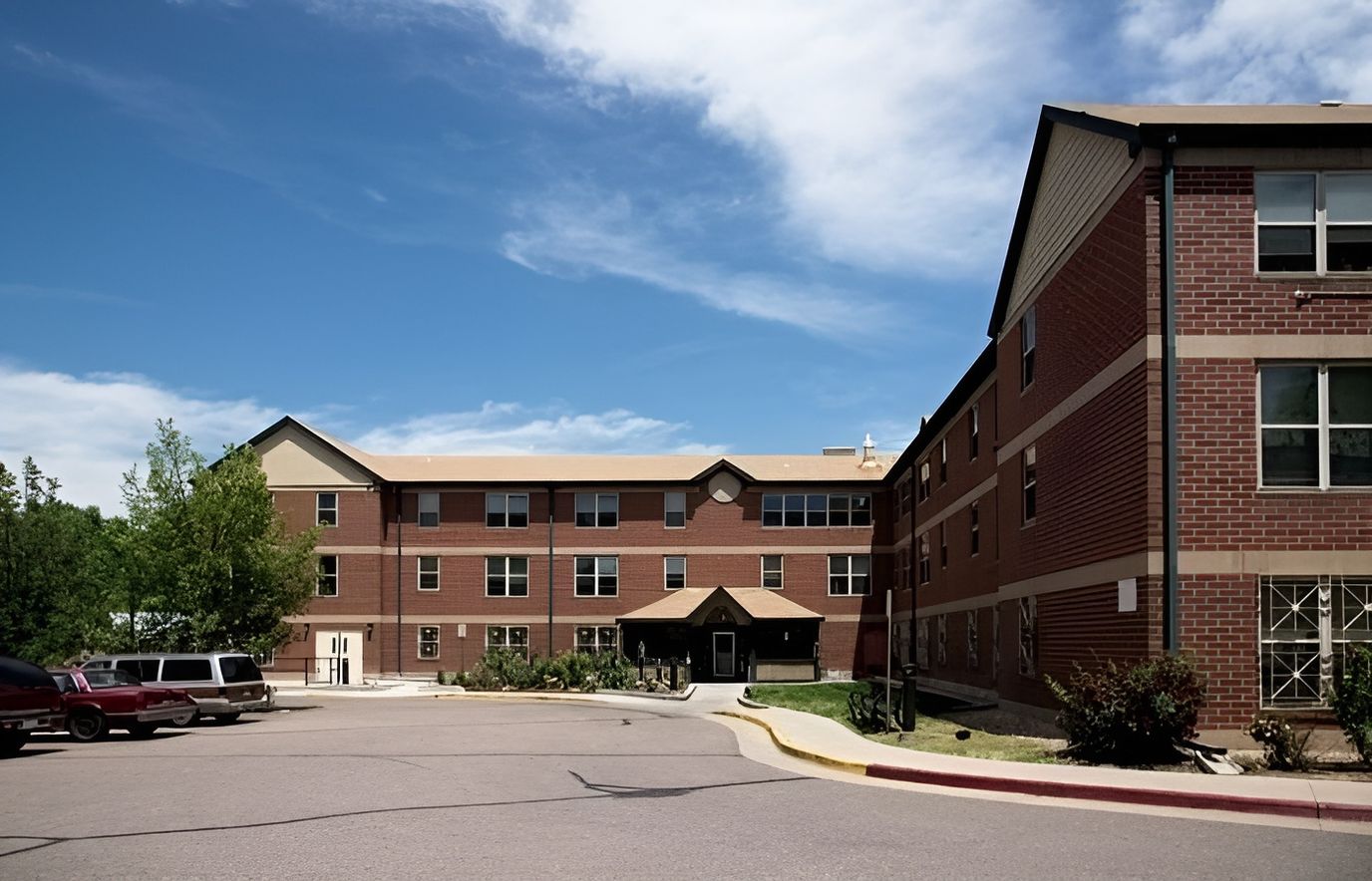 Exterior view of Madonna Plaza building and driveway