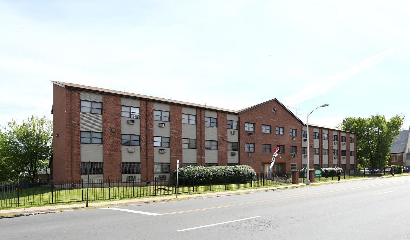 Exterior view of Faith Manor Apartments building