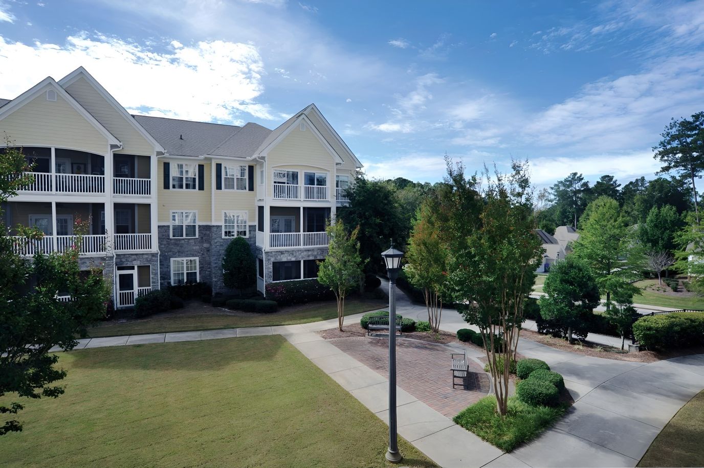 Exterior view of Park View Villas with landscaped grounds