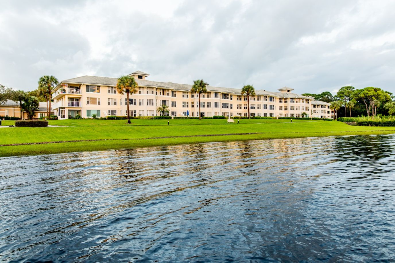 Exterior view of a retirement living facility by the water