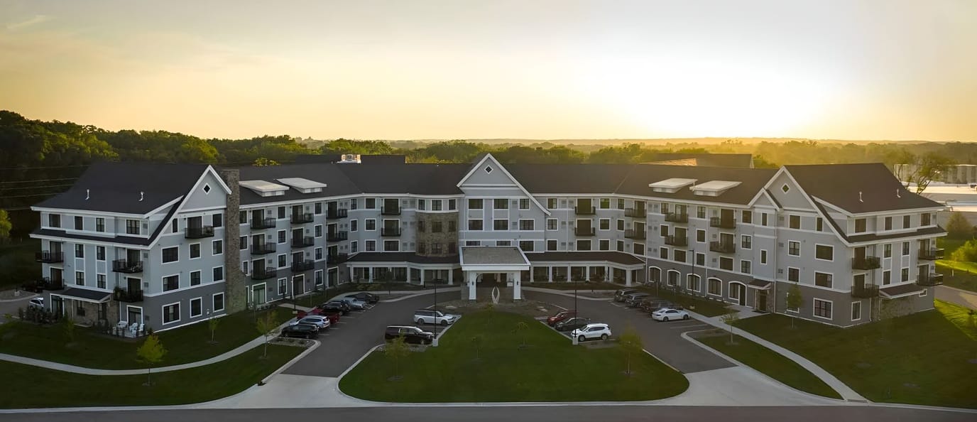 Aerial view of the Grand Living at Coral Gables building at sunset