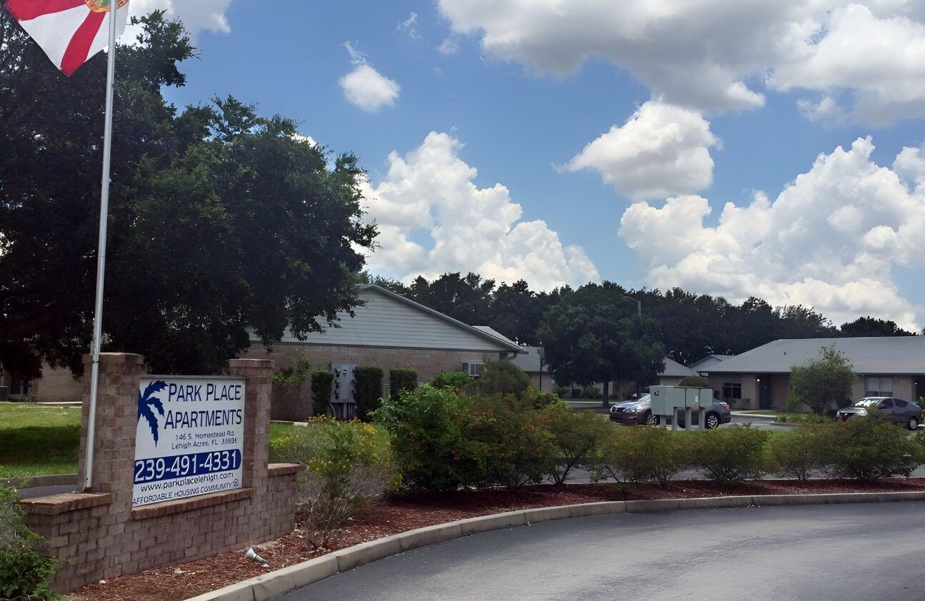 Entrance sign and building exterior of Park Place Apartments