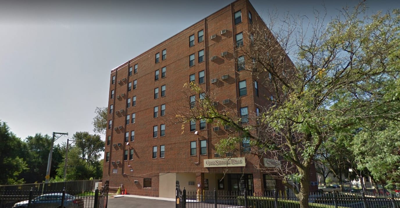 Exterior view of Good Shepherd Tower, a senior living facility