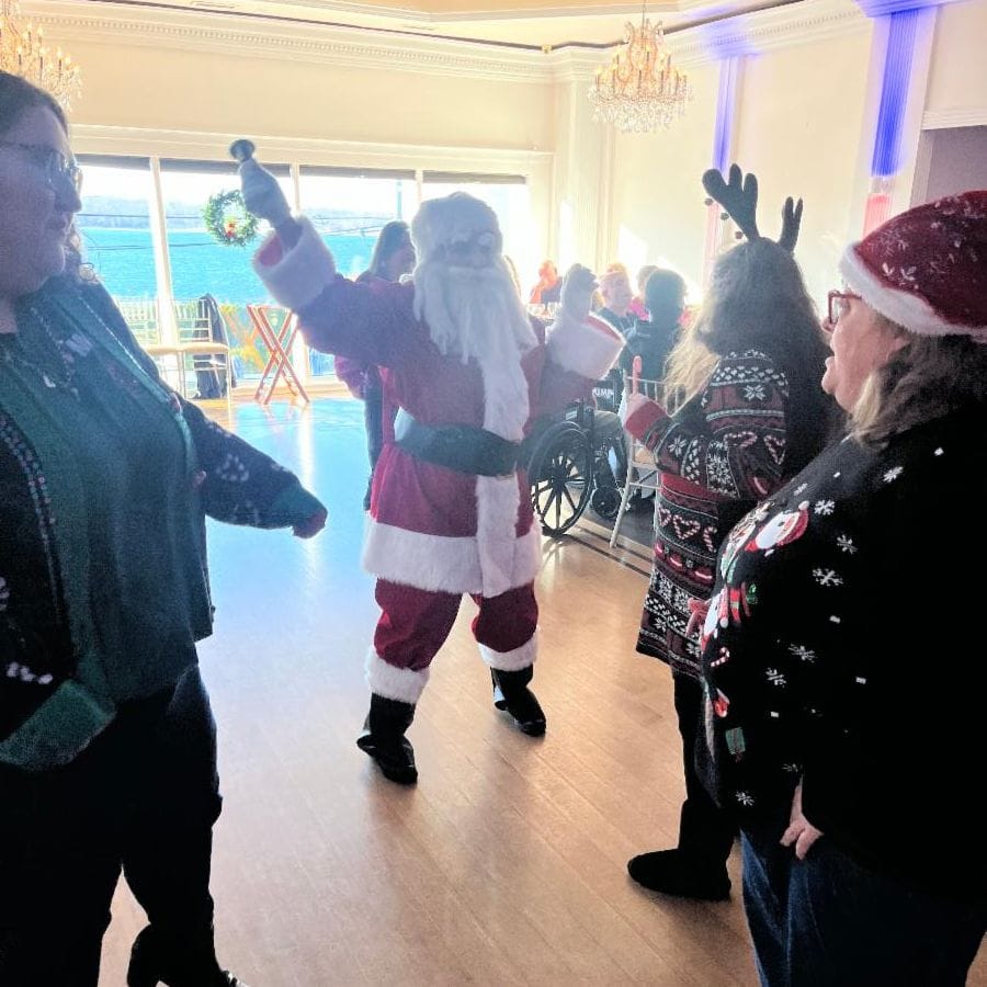Residents gathering and celebrating with Santa Claus