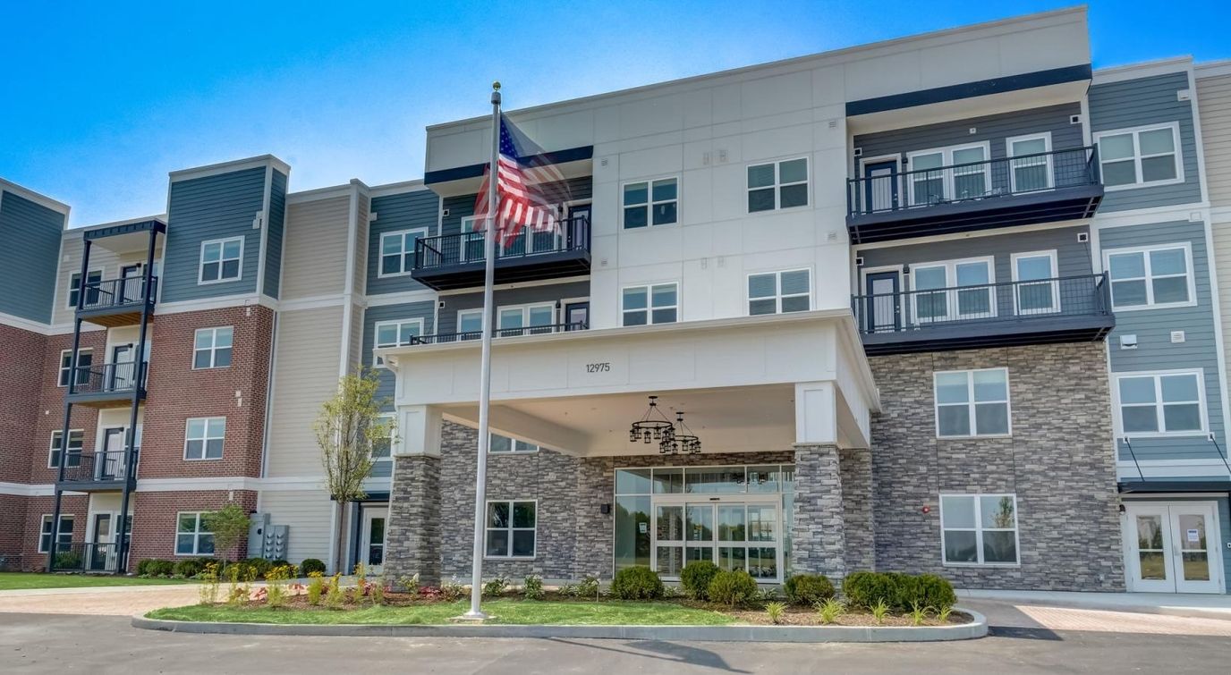 Exterior view of Outlook Hamilton with American flag