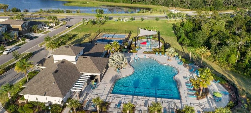 Aerial view of a swimming pool and outdoor amenities
